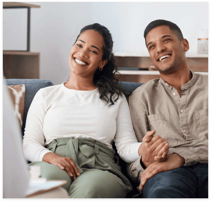 Smiling couple seated together